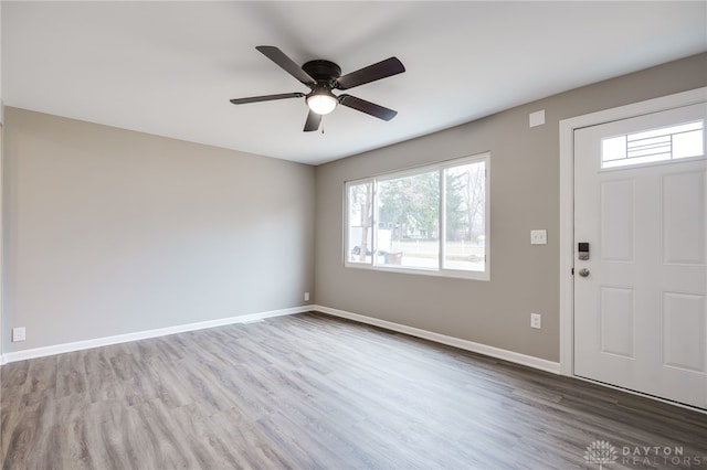 foyer entrance featuring ceiling fan and hardwood / wood-style floors