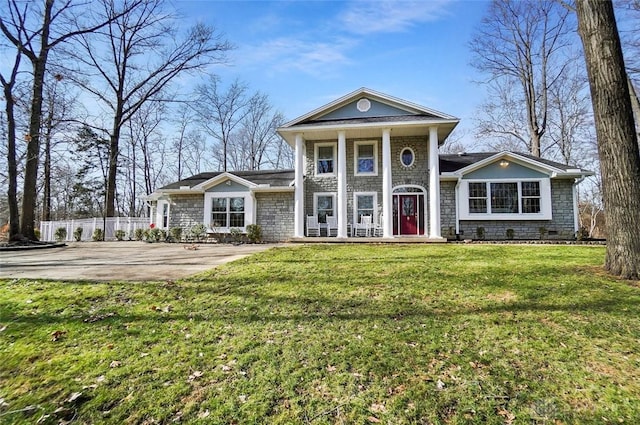 greek revival house with a front yard