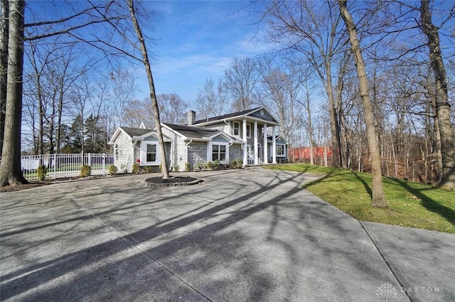 view of front of home with a front yard