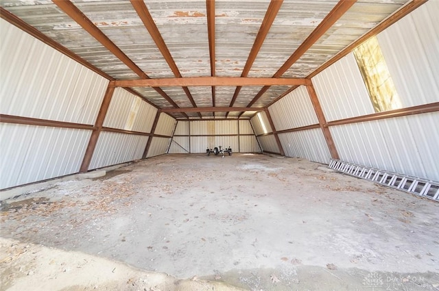 garage featuring baseboard heating