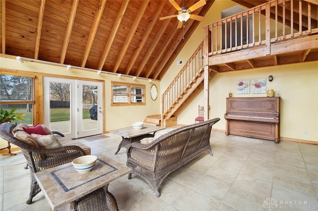 tiled living room with wood ceiling, ceiling fan, beam ceiling, and high vaulted ceiling