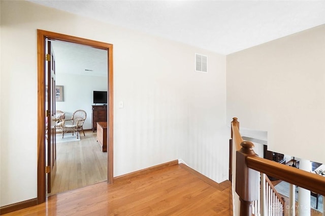 hallway featuring light hardwood / wood-style floors