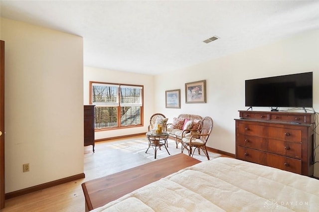 bedroom featuring light hardwood / wood-style floors