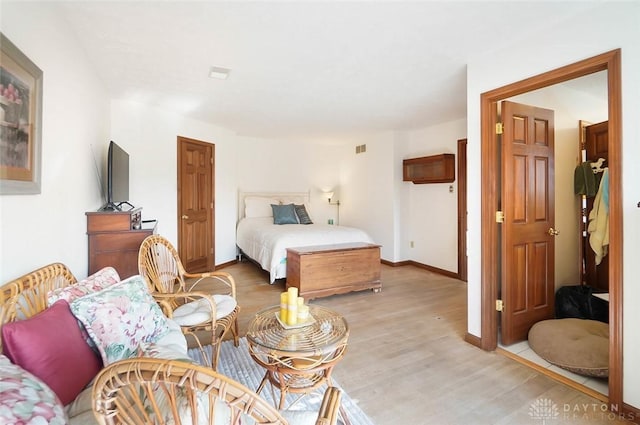 bedroom featuring light wood-type flooring