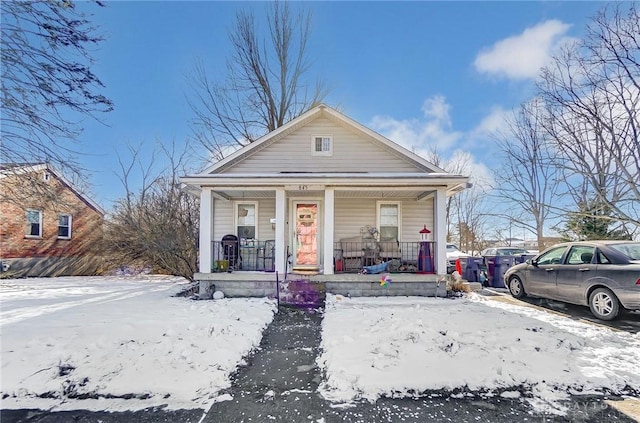 bungalow featuring covered porch