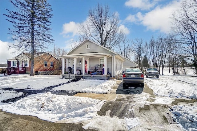 view of front of property featuring covered porch