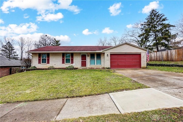 ranch-style house with a garage and a front yard