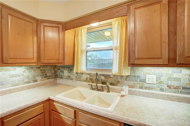 kitchen with sink and decorative backsplash