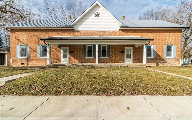 view of front of house featuring a front yard and covered porch