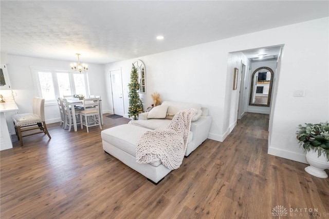 330 W Spring St, Eaton, OH 45320 - living area with a chandelier, baseboards, dark wood-style floors, and recessed lighting