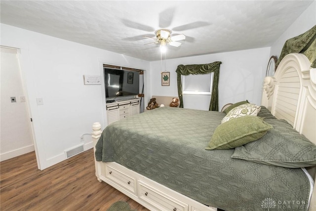330 W Spring St, Eaton, OH 45320 - bedroom featuring dark wood-type flooring, baseboards, and ceiling fan