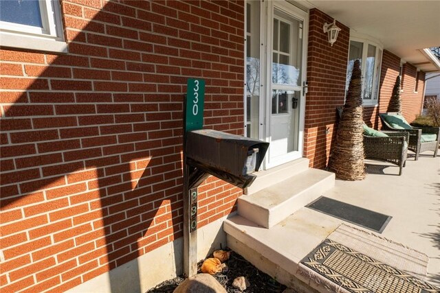 330 W Spring St, Eaton, OH 45320 - property entrance with brick siding