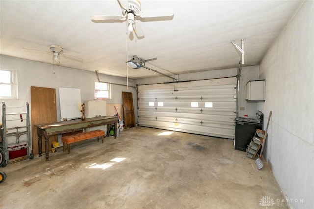 330 W Spring St, Eaton, OH 45320 - garage featuring a garage door opener and ceiling fan