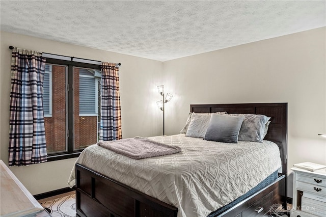 bedroom featuring a textured ceiling