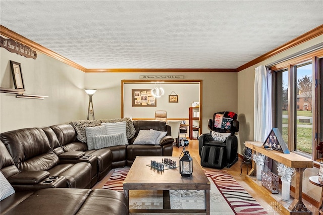 living room with crown molding, a textured ceiling, and light wood-type flooring