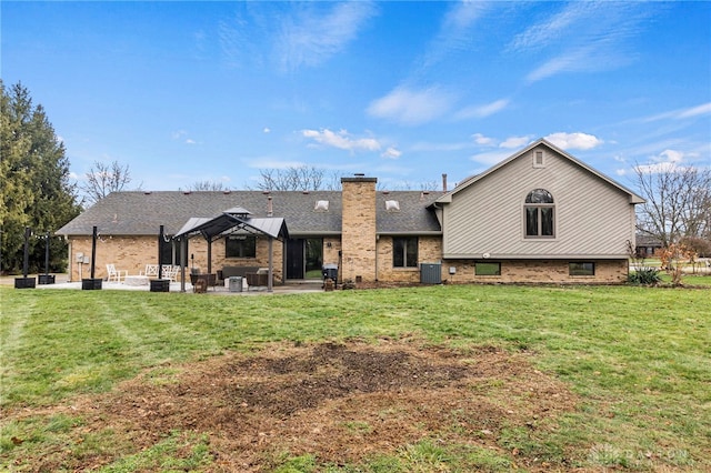 rear view of property featuring a gazebo, a lawn, a patio, and central air condition unit