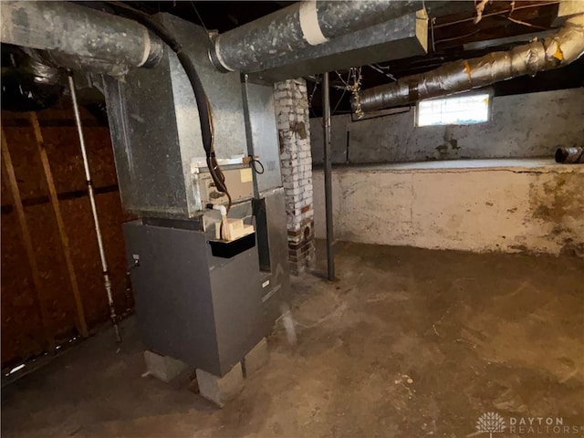 basement featuring heating unit