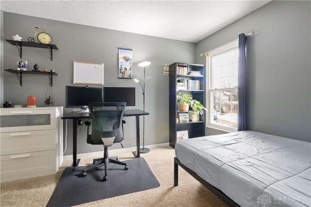 carpeted bedroom with a textured ceiling