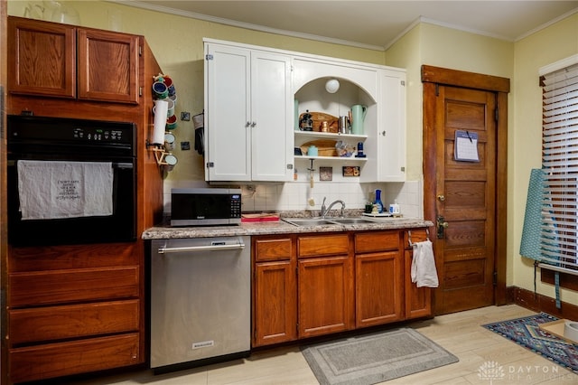 kitchen featuring sink, backsplash, ornamental molding, stainless steel appliances, and light wood-type flooring