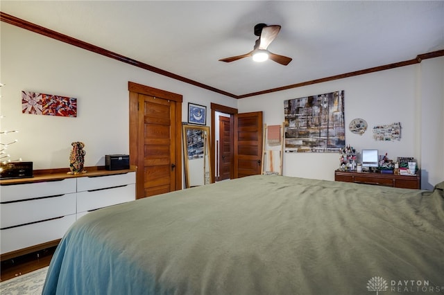 bedroom featuring crown molding and ceiling fan