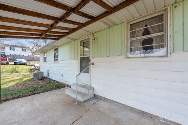 view of exterior entry with central AC