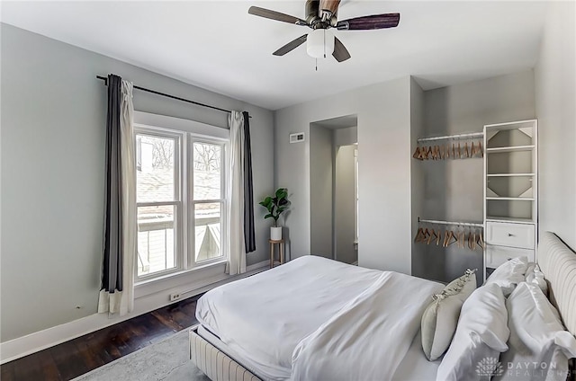 bedroom featuring hardwood / wood-style flooring and ceiling fan