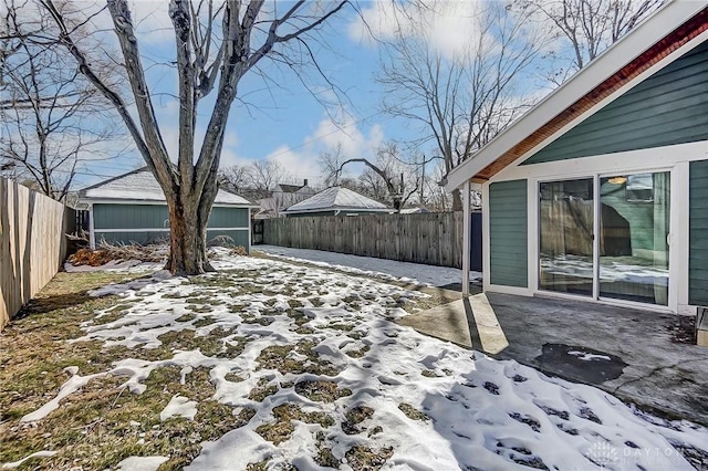 view of yard layered in snow