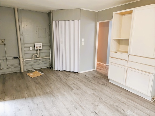 unfurnished bedroom with light hardwood / wood-style flooring