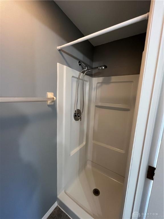 bathroom featuring walk in shower