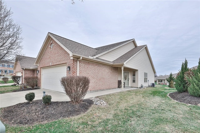 view of home's exterior featuring a garage and a lawn