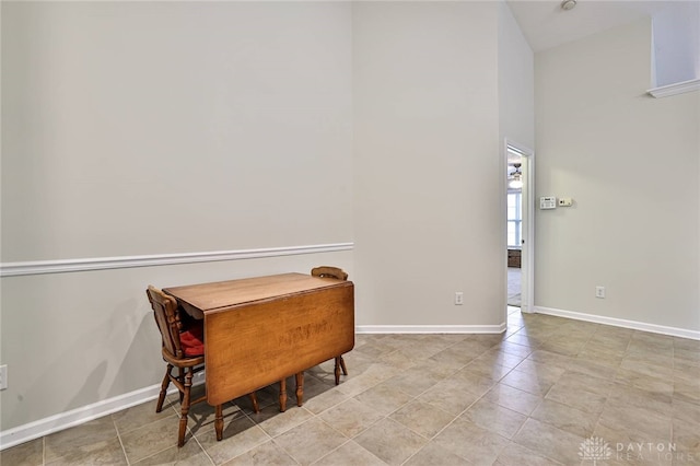 sitting room with tile patterned floors