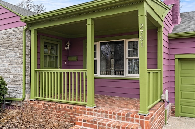 entrance to property with a porch