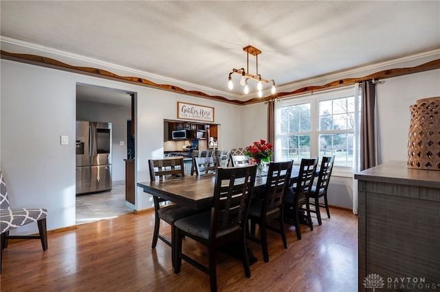 dining room with hardwood / wood-style floors