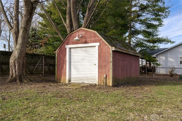 view of outbuilding with a lawn