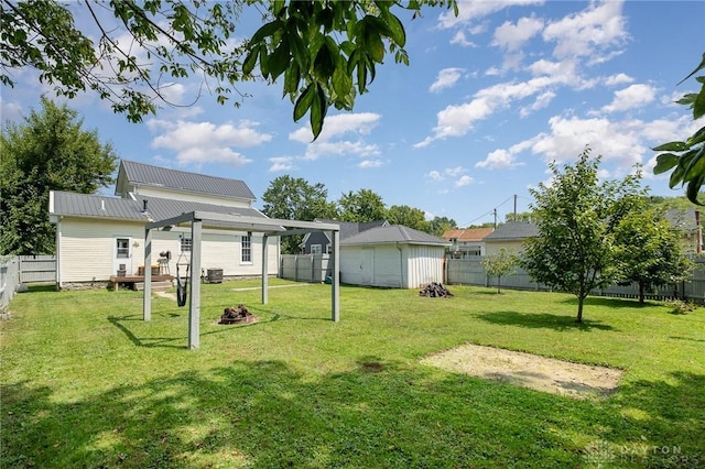 back of house with a yard