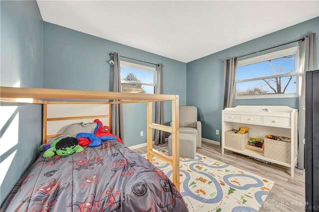 bedroom featuring light wood-type flooring