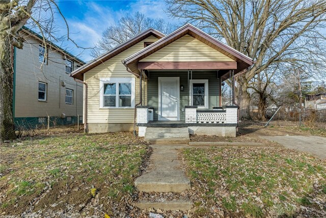 bungalow-style home featuring covered porch