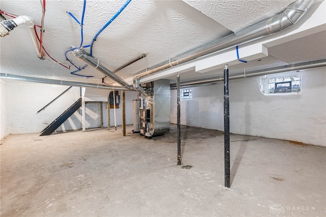 basement featuring heating unit