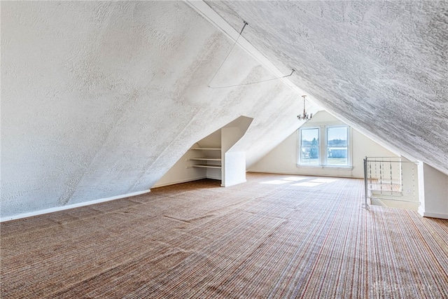 bonus room featuring vaulted ceiling, a textured ceiling, and carpet floors