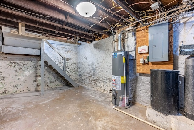 basement with gas water heater and electric panel