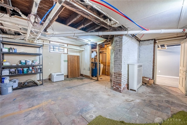 basement featuring water heater