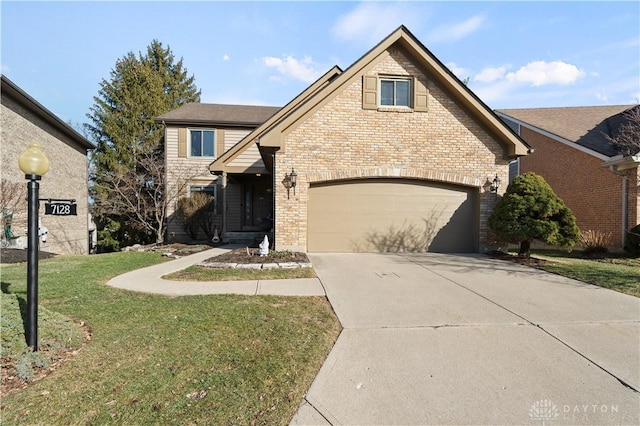 view of property with a garage and a front lawn