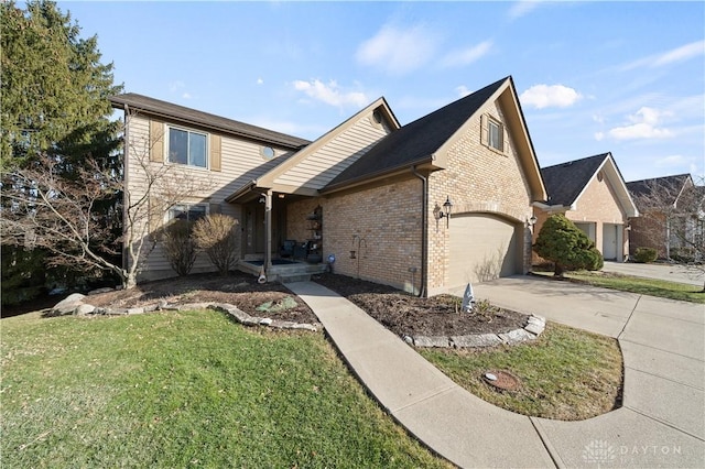 view of property featuring a garage and a front lawn