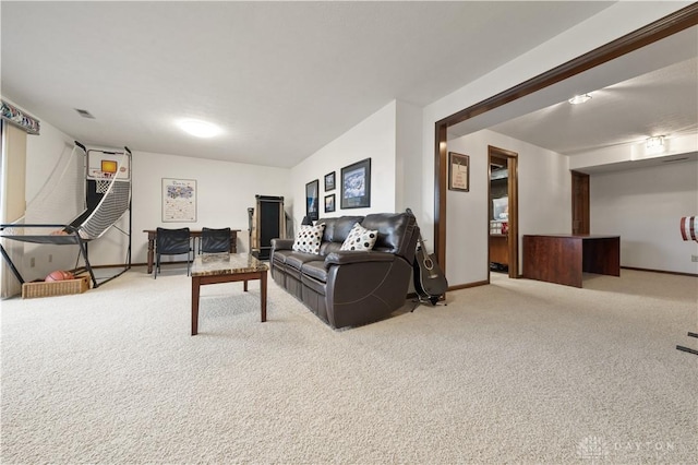 living room featuring light colored carpet