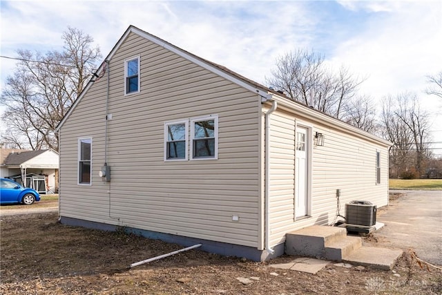 view of home's exterior featuring central air condition unit