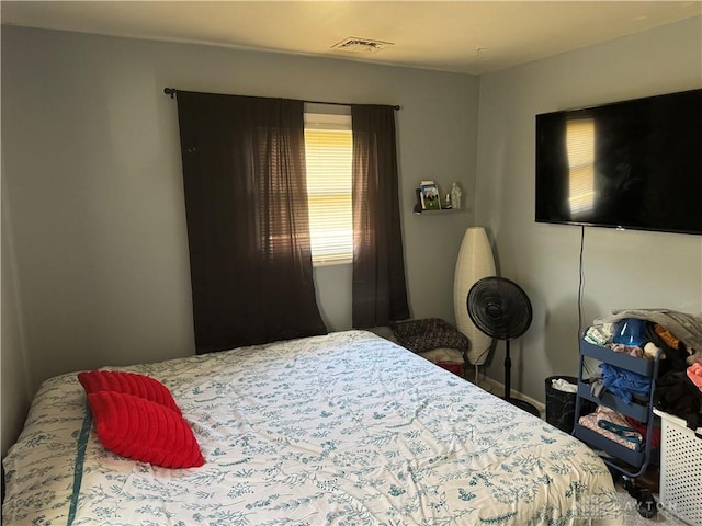 bedroom with visible vents