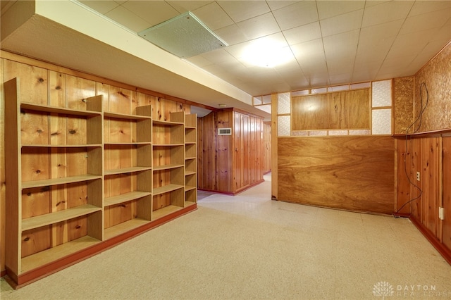 interior space featuring wood walls