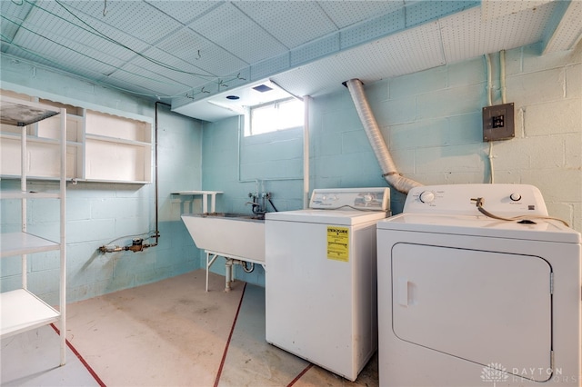 laundry room featuring sink and washing machine and dryer