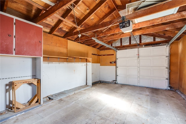 garage featuring a garage door opener