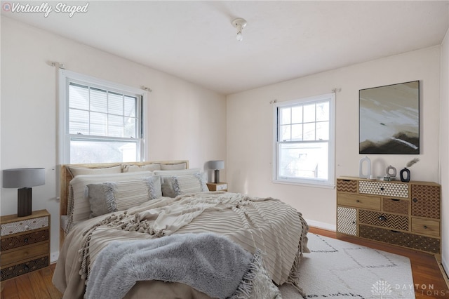 bedroom featuring wood-type flooring